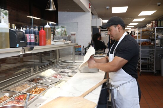 Executive Chef Joe Lucci prepares one of Sicily's craft pizzas. 