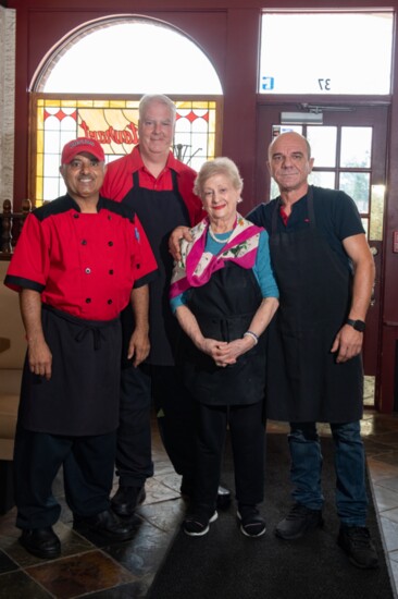 Foxy Pizza L-R:  Assistant Cooks, Mohamed,  Sahoobah and Keith Nystrup.  Original Founder, Georgia Varlas, and Assistant Chef, Pavilo Sade.