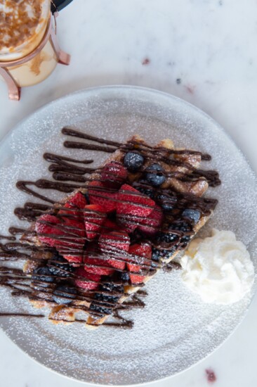 Zinneken's Berries Insanity Liege Waffle with Nutella and Whip Cream and a Belgian Speculoos Latte.